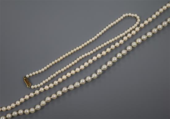 A cultured pearl drop, a cultured pearl necklace and two other necklaces.